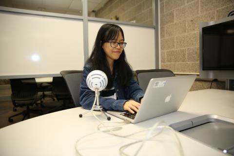 Student at a microphone