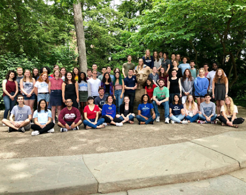 Group of students at Penn State with the Nittany Lion statue