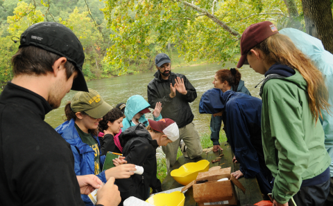 Smithsonian-Mason Semester students testing water on learning about watershed management on the Shenandoah River. Photo by Evan Cantwell/Creative Services/George Mason University.