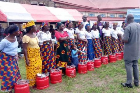 Residents learning about clean cooking stoves