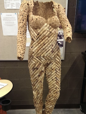 Sculpture of a woman's figure made from wine bottle corks