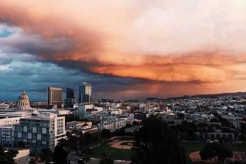 Storm clouds roll in over a city