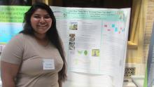 Photo of EnvironMentors Student with her poster